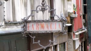 ornate metal shop sign