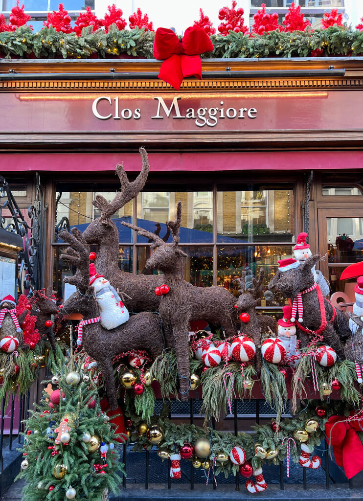 Christmas decorations outside Clos Maggiore. Copyright@2024 mapandfamily.com
